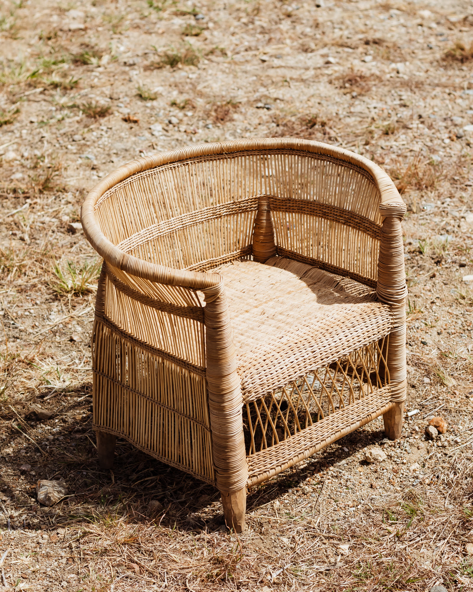 Handwoven Malawian chair in natural cane