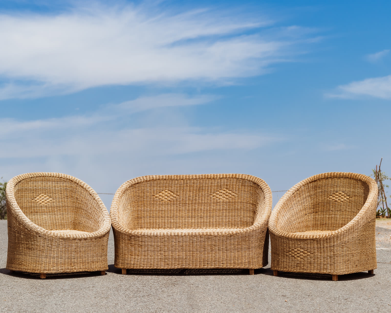 Curved Rattan Couch Set — handwoven to order in 2–4 weeks.